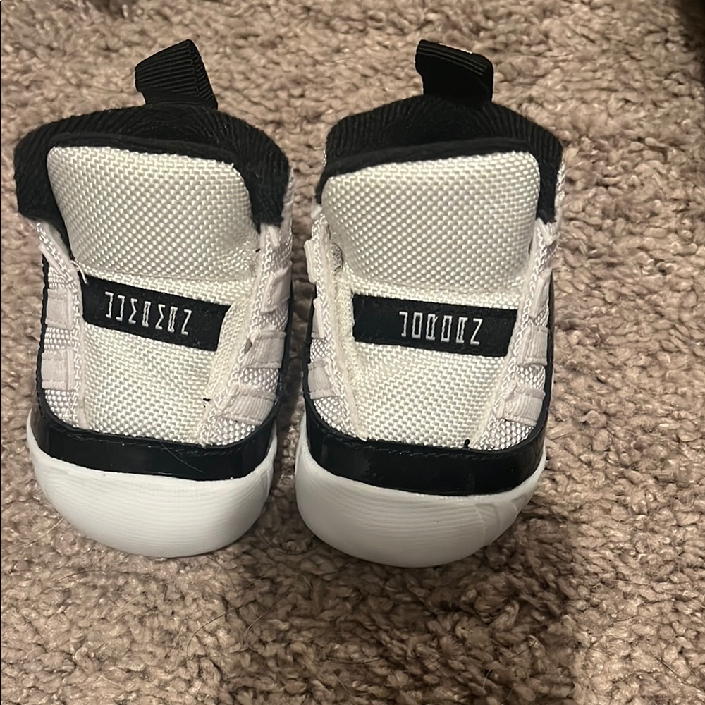 Jordan retro 11s black and white